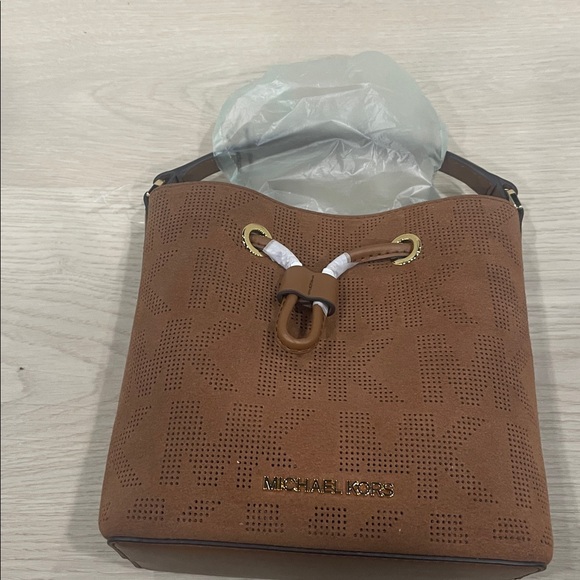 Michael Kors Tan Perforated Bucket Bag - Picture 1 of 10